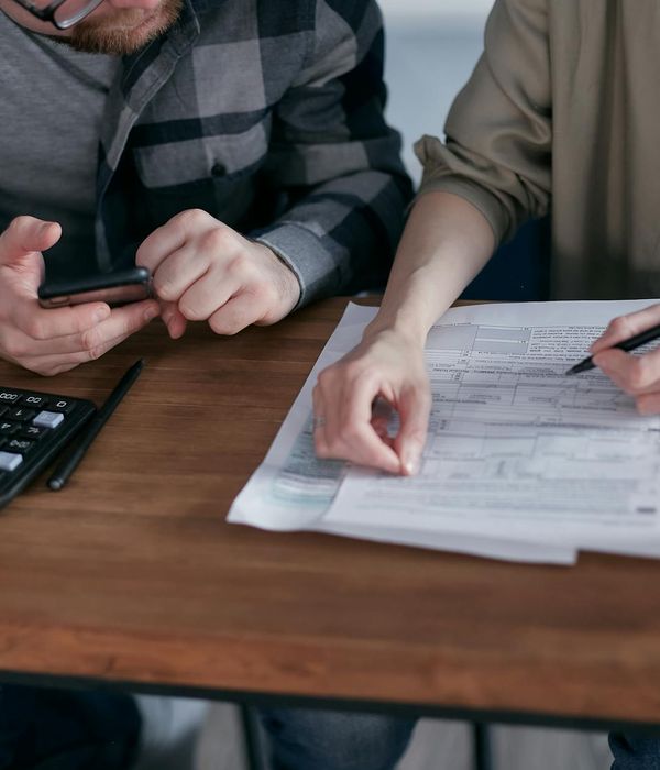 Budget planning with calculator and documents